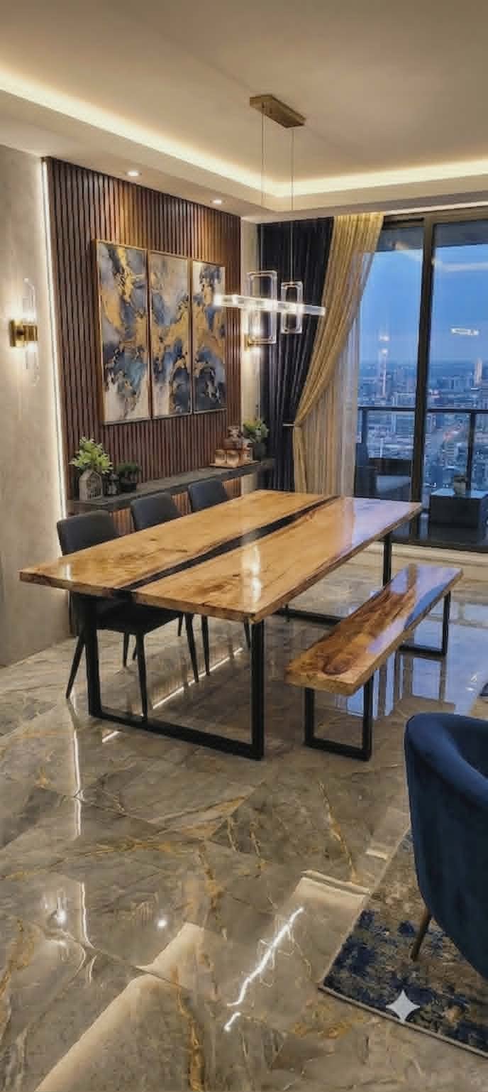 Ensemble de salle à manger en bois massif — table et banc à rivière d'époxy sur pieds en métal noir, dans un condo avec vue urbaine — Les Bois Rustiques MG